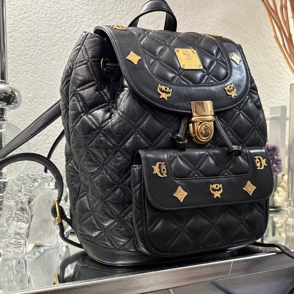 EUC AUTH MCM Black and Gold Quilted Backpack, adjustable-made in Germany